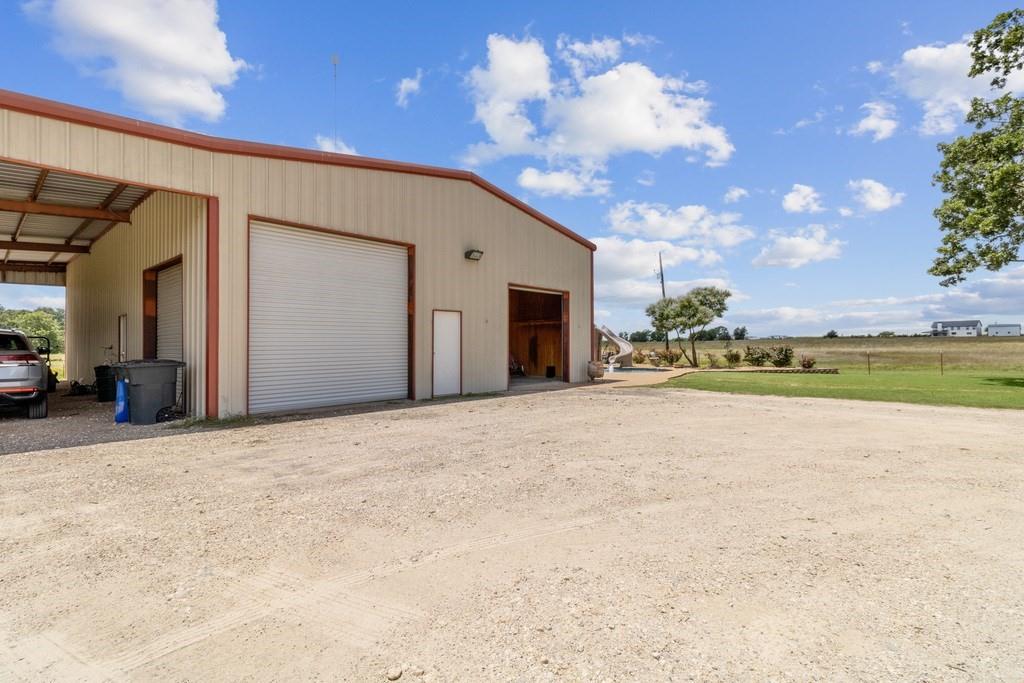 800 County Road 2807 Mabank, TX 75147 - Photo 11 of 39 a view of an empty room with a garage
