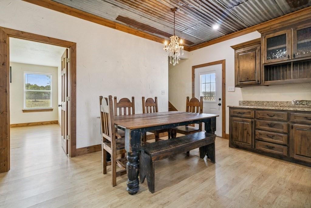 800 County Road 2807 Mabank, TX 75147 - Photo 16 of 39 a view of a dining room with furniture