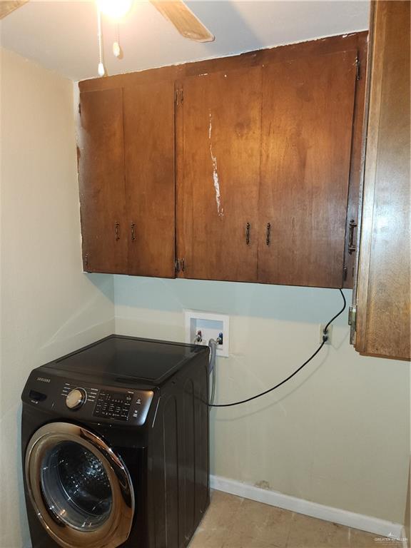 3021 Nyssa Avenue McAllen, TX 78501 - Photo 24 of 24 a bathroom with a sink and a washer dryer