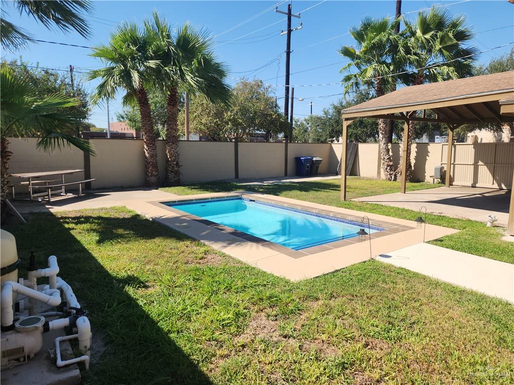 3021 Nyssa Avenue McAllen, TX 78501 - Photo 3 of 24 a view of a backyard with plants and swimming pool