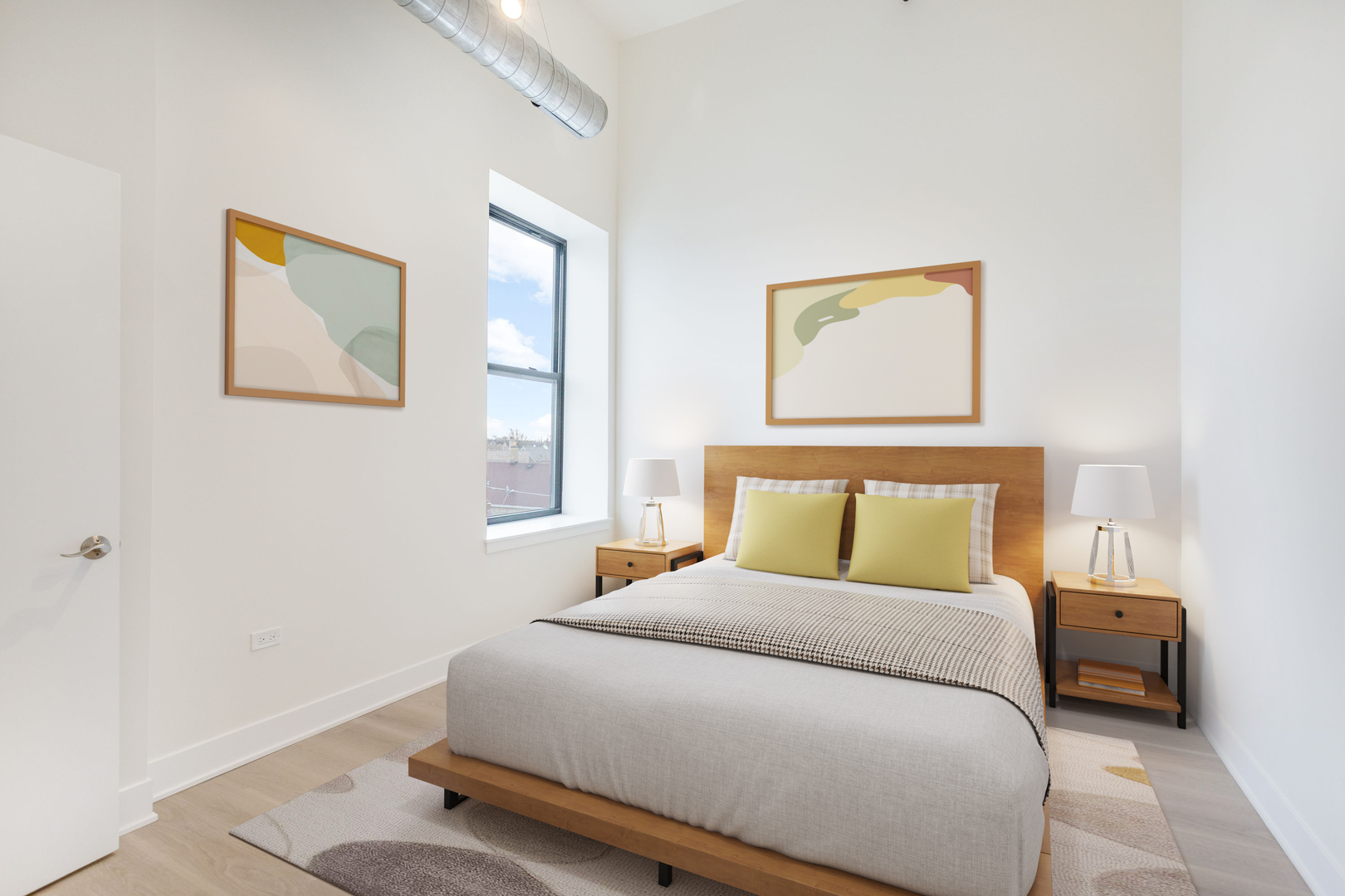 3801 West 26th Street, Unit 301 Chicago, IL 60623 - Photo 9 of 12 a bedroom with a bed and wooden floor