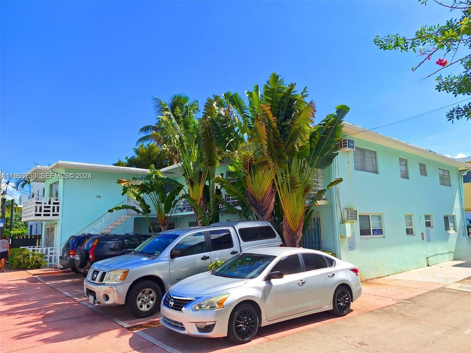 710 11th Street, Unit 8 Miami Beach, FL 33139 - Photo 3 of 15 a front view of a house with parking space