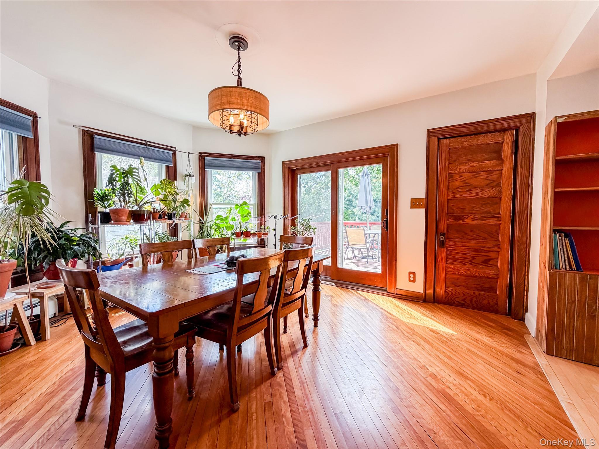 350 Smith Street Peekskill, NY 10566 - Photo 13 of 32 a view of a dining room with furniture window and wooden floor