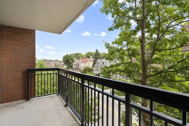 a view of a balcony with an outdoor space