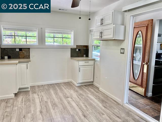 35.5 Kent Court Moraga, CA 94556 - Photo 11 of 17 a kitchen with stainless steel appliances a refrigerator sink and cabinets