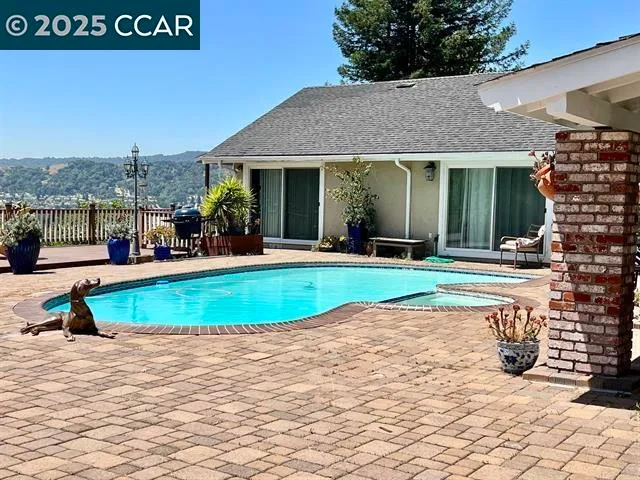 a view of a house with a swimming pool