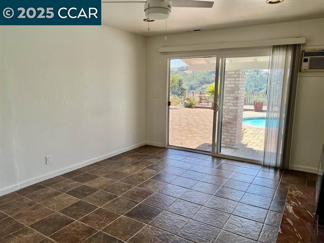 35.5 Kent Court Moraga, CA 94556 - Photo 5 of 17 an empty room with wooden floor and windows
