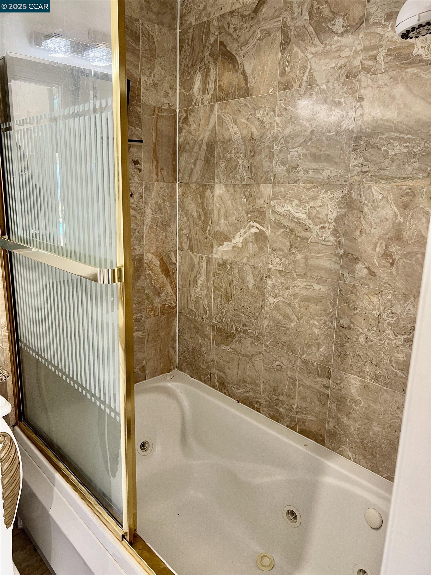 35.5 Kent Court Moraga, CA 94556 - Photo 9 of 17 a bathroom with a bathtub