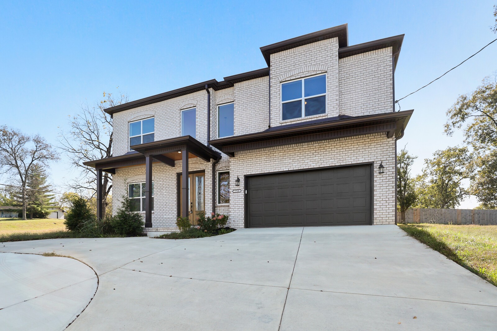 1760 West Main Street Lebanon, TN 37087 - Photo 3 of 89 a front view of a house with yard