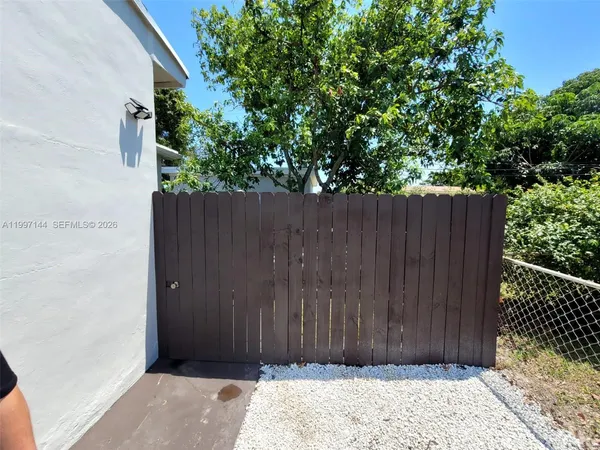 a view of wooden fence