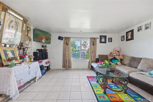 a kitchen with stainless steel appliances a refrigerator sink and cabinets
