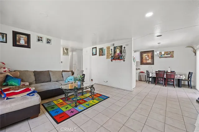 a bedroom with a bed and a desk