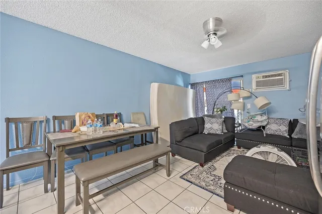 a bedroom with bed and a window