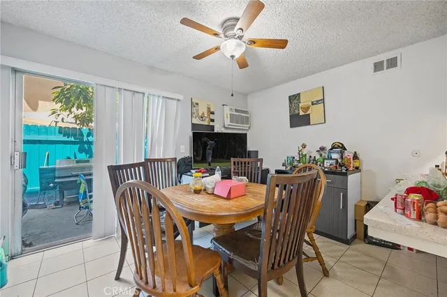a kitchen with stainless steel appliances white cabinets and a sink