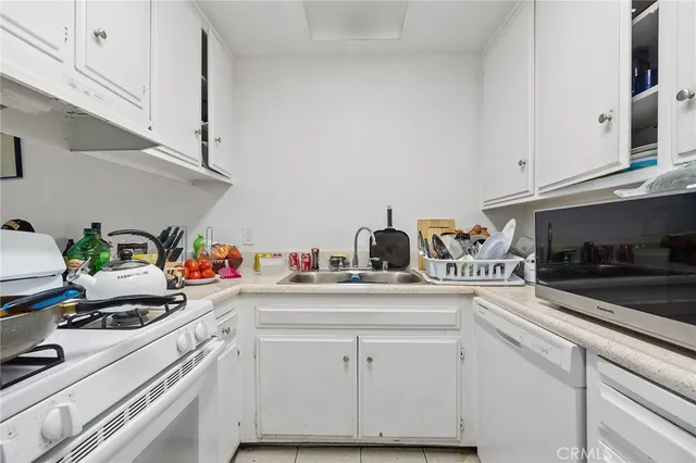 a living room with a couch and a flat screen tv