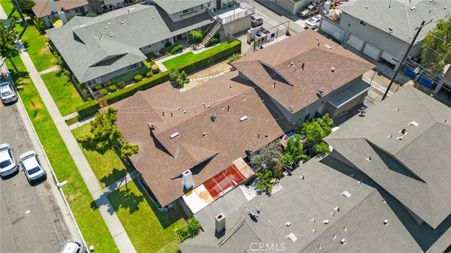 a living room with furniture and next to a window