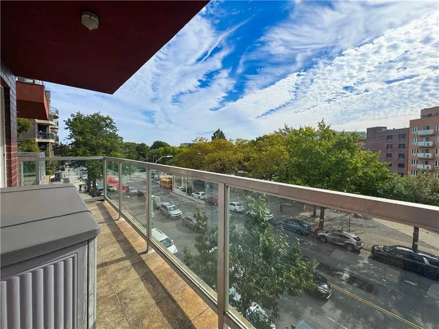 a view of balcony with furniture