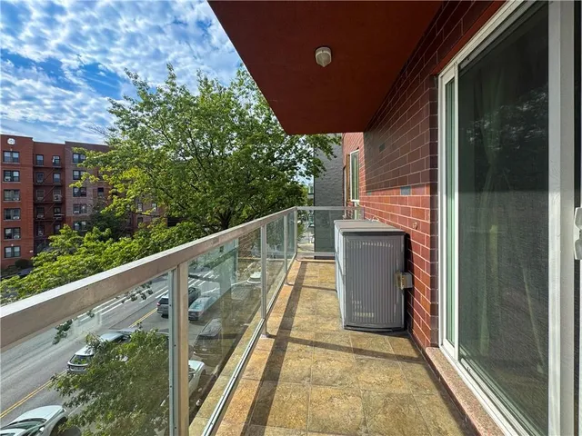 a balcony with an outdoor space