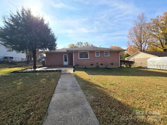 a view of a house with swimming pool