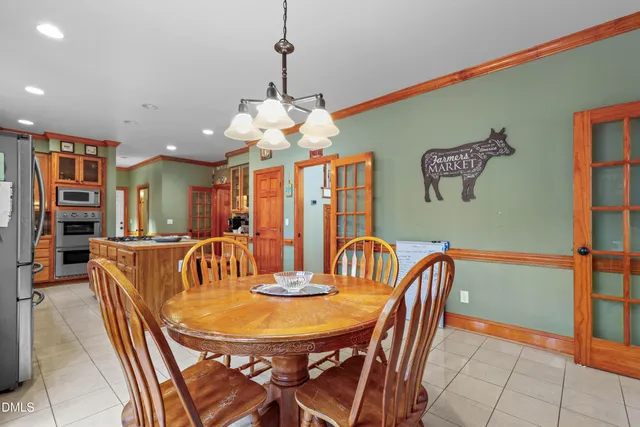 a bedroom with bed and window