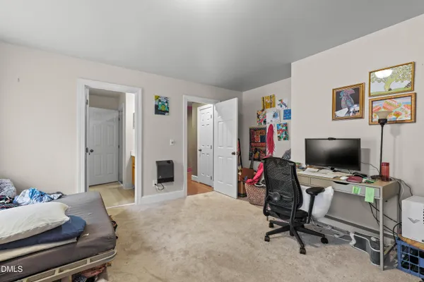 a workspace with furniture and window