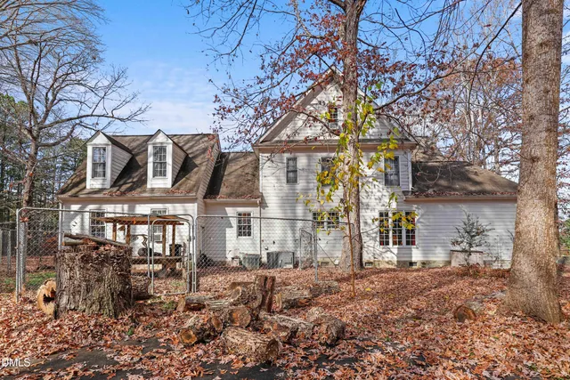 a view of swimming pool with a yard
