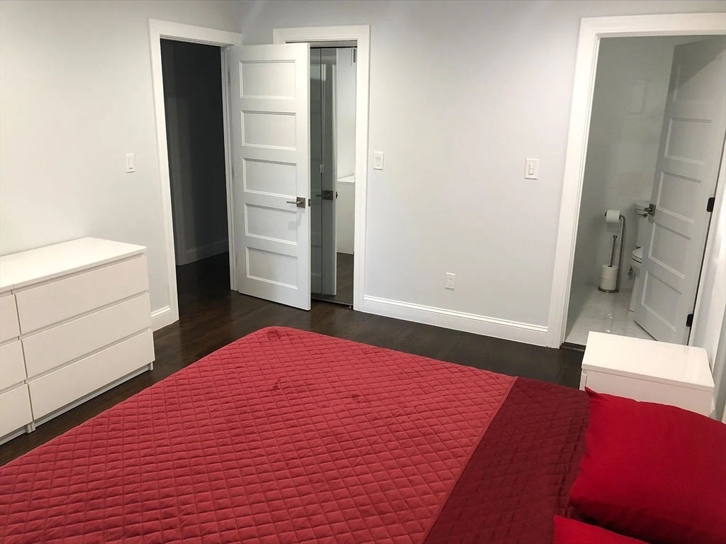 6 Temple Street Framingham, MA 01702 - Photo 11 of 34 a bedroom with a bed and a dresser