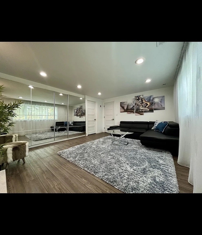 6 Temple Street Framingham, MA 01702 - Photo 12 of 34 a view of a living room and kitchen