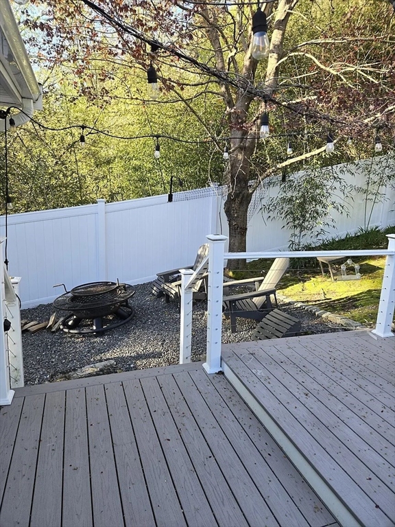 6 Temple Street Framingham, MA 01702 - Photo 25 of 34 a view of a wooden floor with a roof deck
