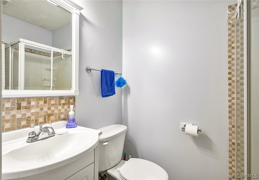 30 Buckner Road Bumpass, VA 23024 - Photo 16 of 25 7X5 primary bathroom with single vanity with stora