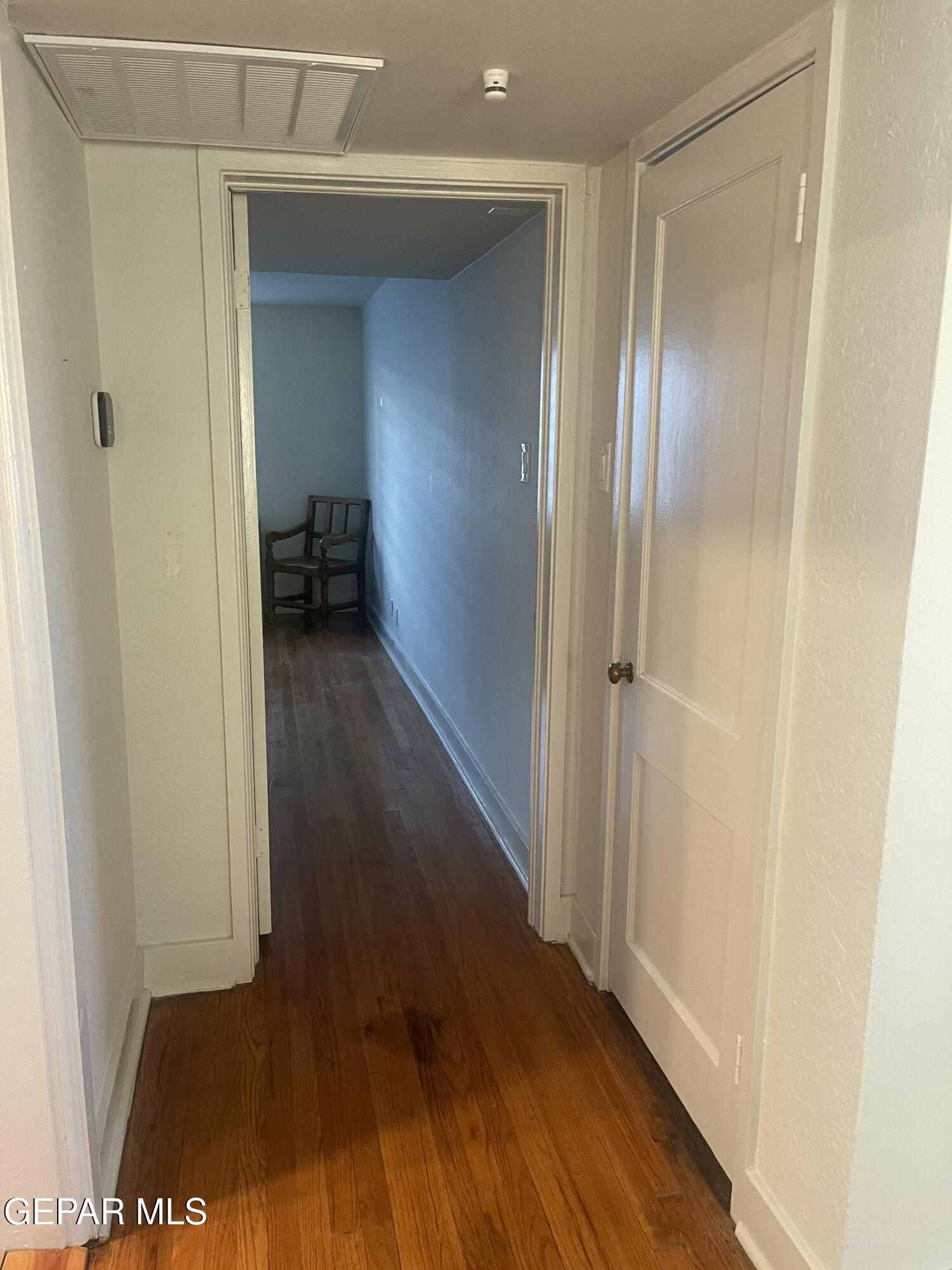 1415 North Ochoa Street, Unit B El Paso, TX 79902 - Photo 11 of 17 a view of a hallway with wooden floor