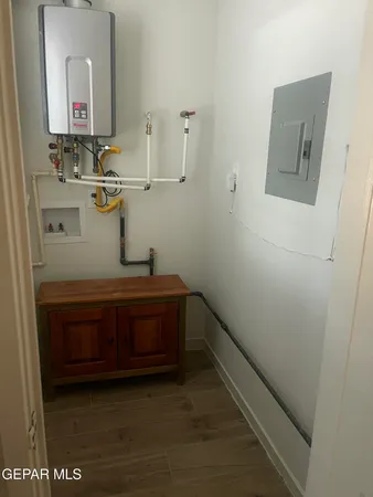 a room with a sink and a mirror