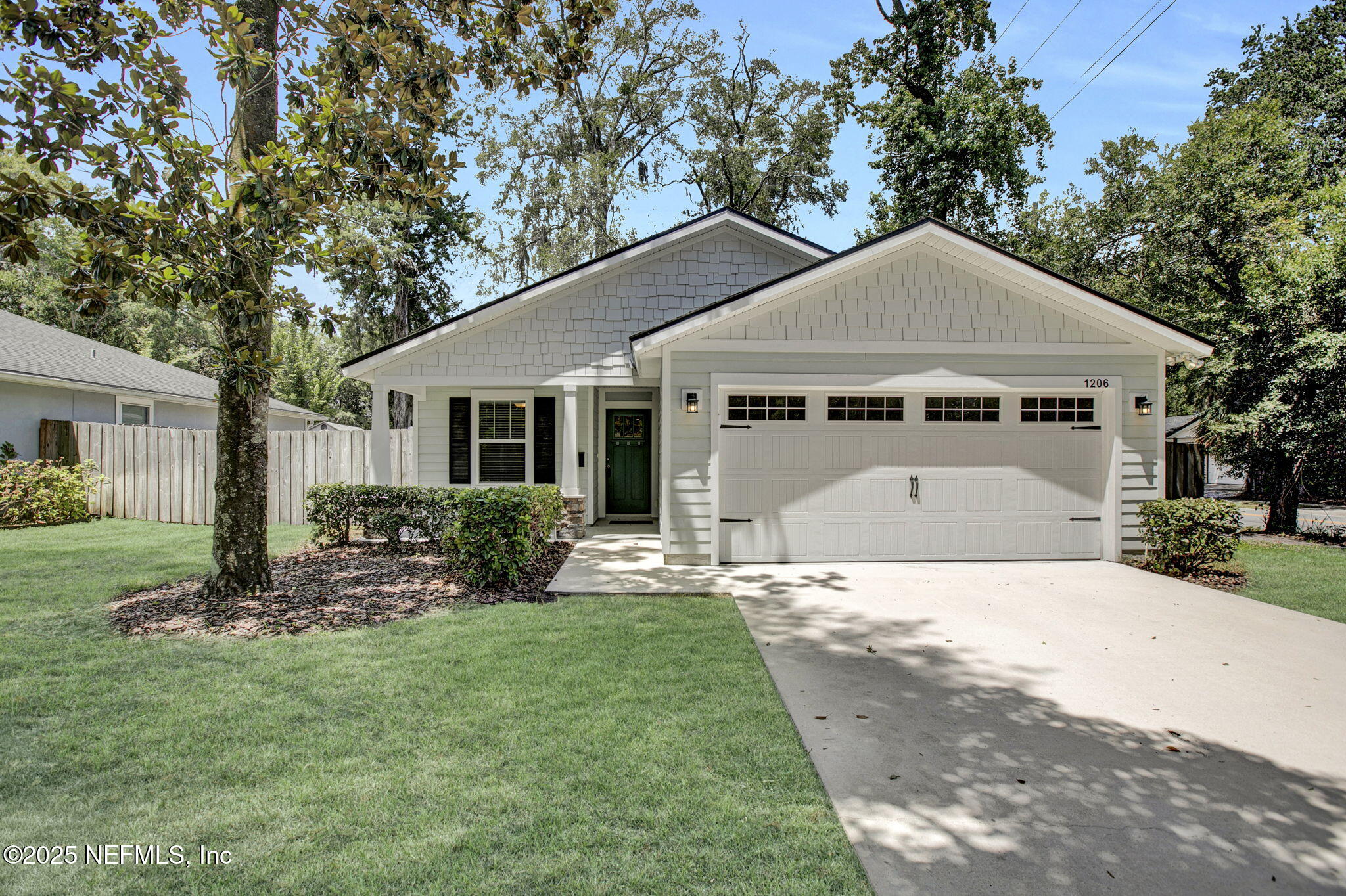 1206 Murray Drive Jacksonville, FL 32205 - Photo 1 of 23 a front view of a house with a yard