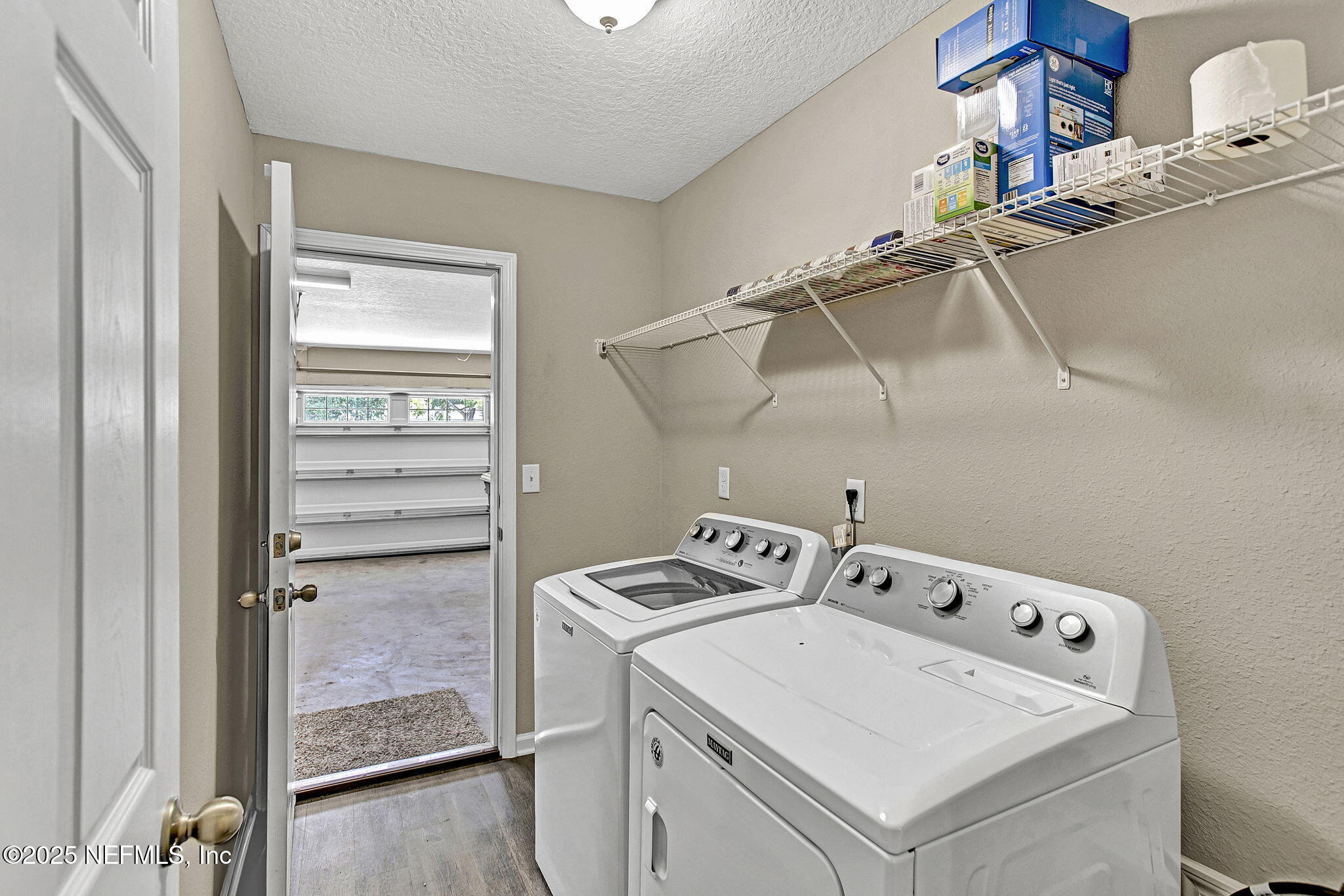 1206 Murray Drive Jacksonville, FL 32205 - Photo 16 of 23 a utility room with dryer and washer