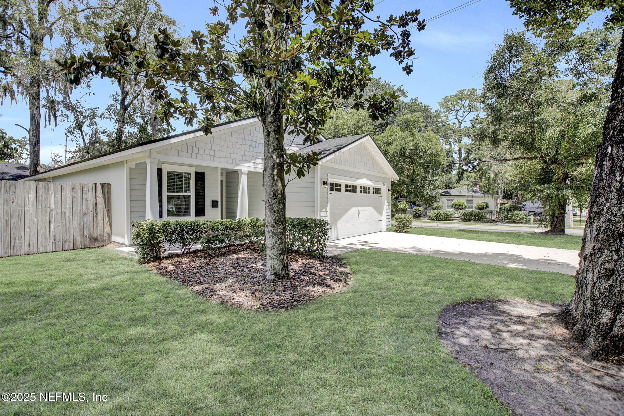 1206 Murray Drive Jacksonville, FL 32205 - Photo 2 of 23 a front view of a house with a yard
