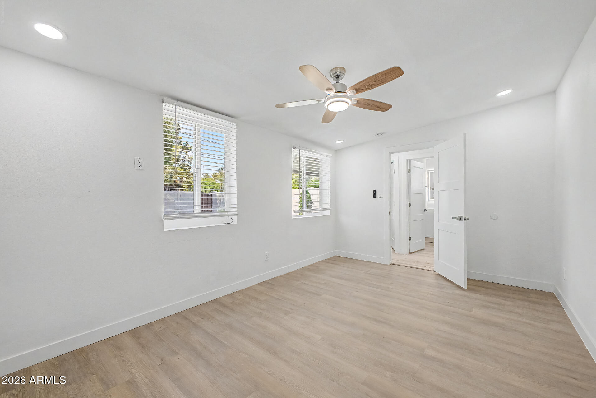 532 East Cheery Lynn Road Phoenix, AZ 85014 - Photo 26 of 37 a view of an empty room with a window