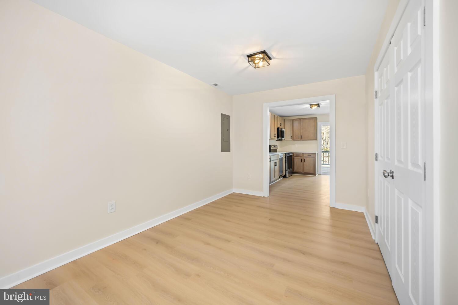 1109 Grasonville Cemetery Road Grasonville, MD 21638 - Photo 15 of 39 a view of empty room with wooden floor