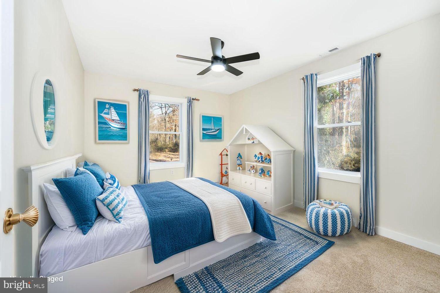 1109 Grasonville Cemetery Road Grasonville, MD 21638 - Photo 20 of 39 a bedroom with a bed and a window