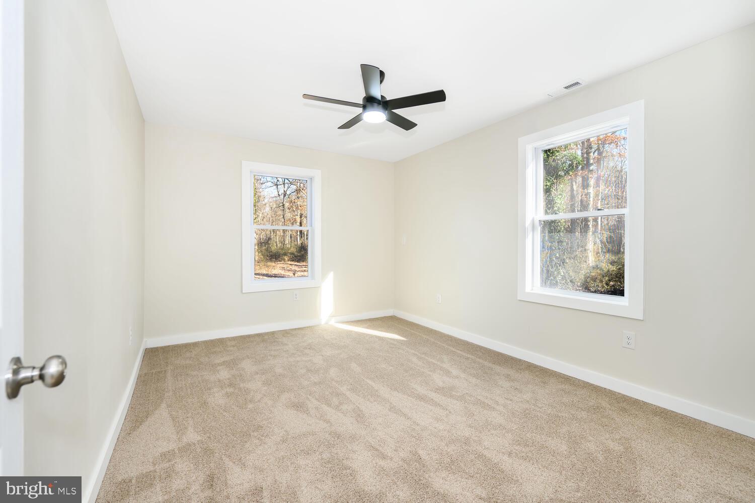 1109 Grasonville Cemetery Road Grasonville, MD 21638 - Photo 21 of 39 a view of an empty room with a window