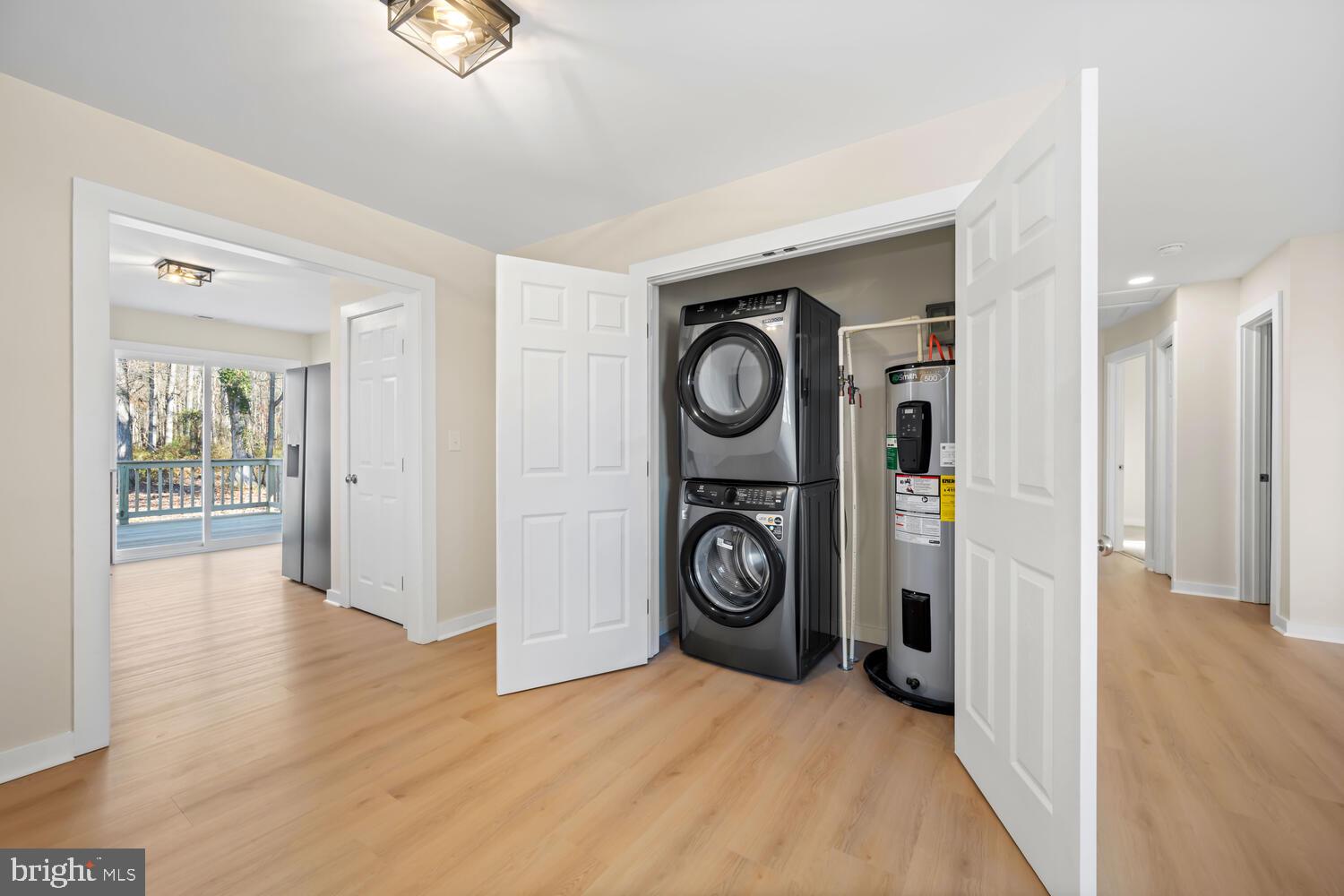 1109 Grasonville Cemetery Road Grasonville, MD 21638 - Photo 27 of 39 a view of a hallway with washer and dryer