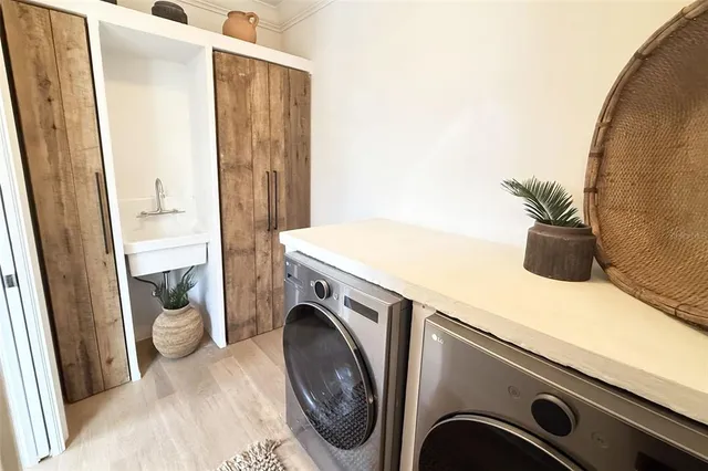 a utility room with dryer and washer