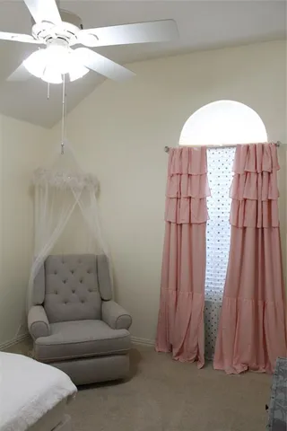 a living room with a couch and a table