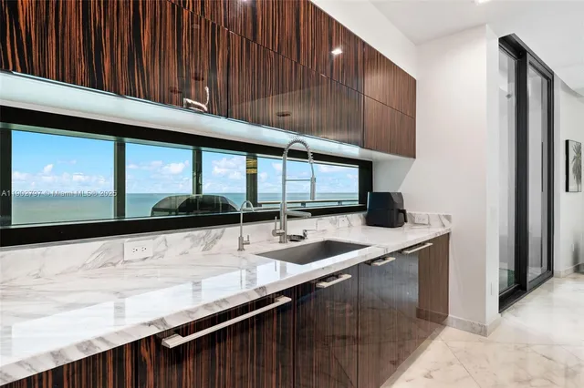 a close up of a sink and a mirror