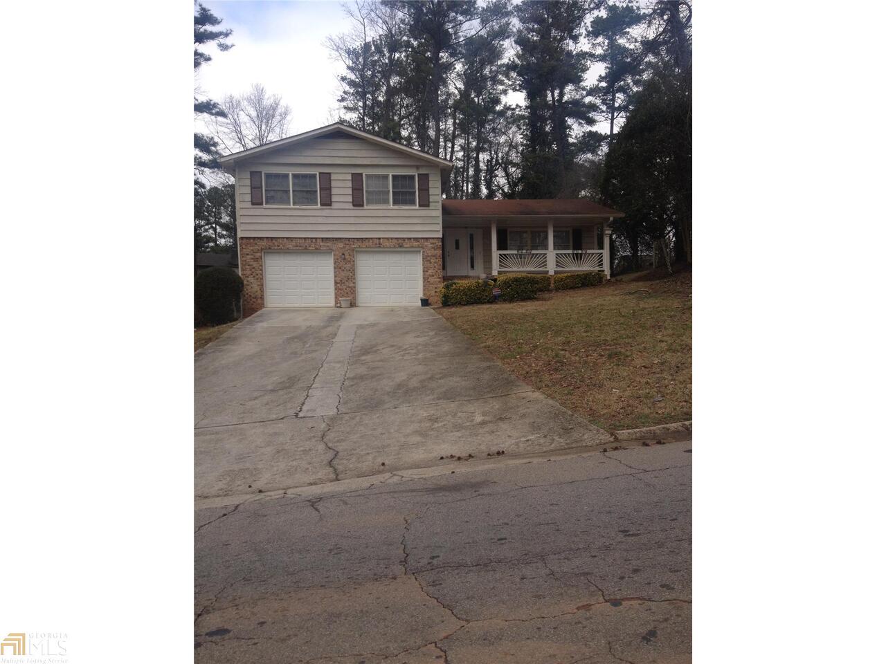 4076 Lehigh Boulevard Decatur, GA 30034 - Photo 1 of 1 a front view of a house with a garden