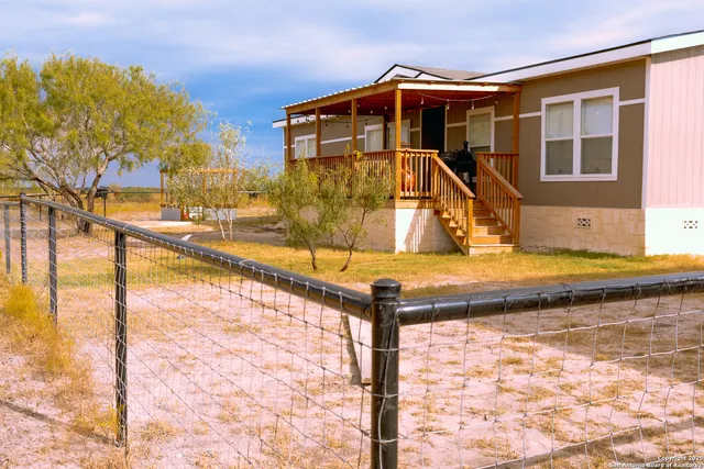 a front view of house with yard