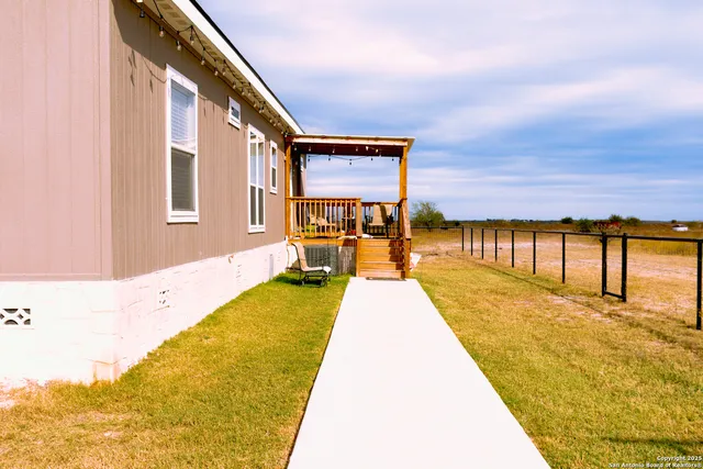 a view of an ocean with a balcony