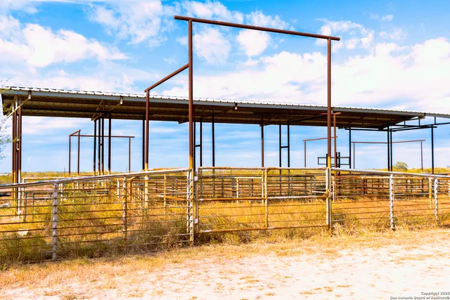a view of a yard with an outdoor space