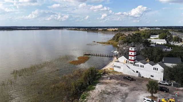 a view of a lake in middle of a city