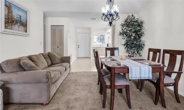 a view of a livingroom and dining room