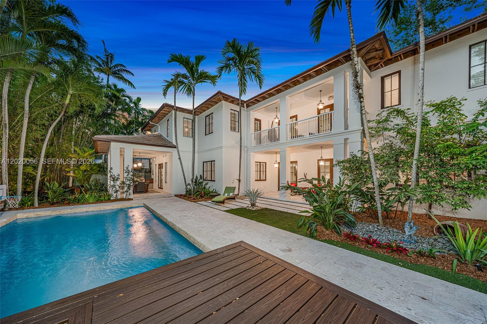 4196 Douglas Road Miami, FL 33133 - Photo 6 of 96 a view of a house with backyard and sitting area